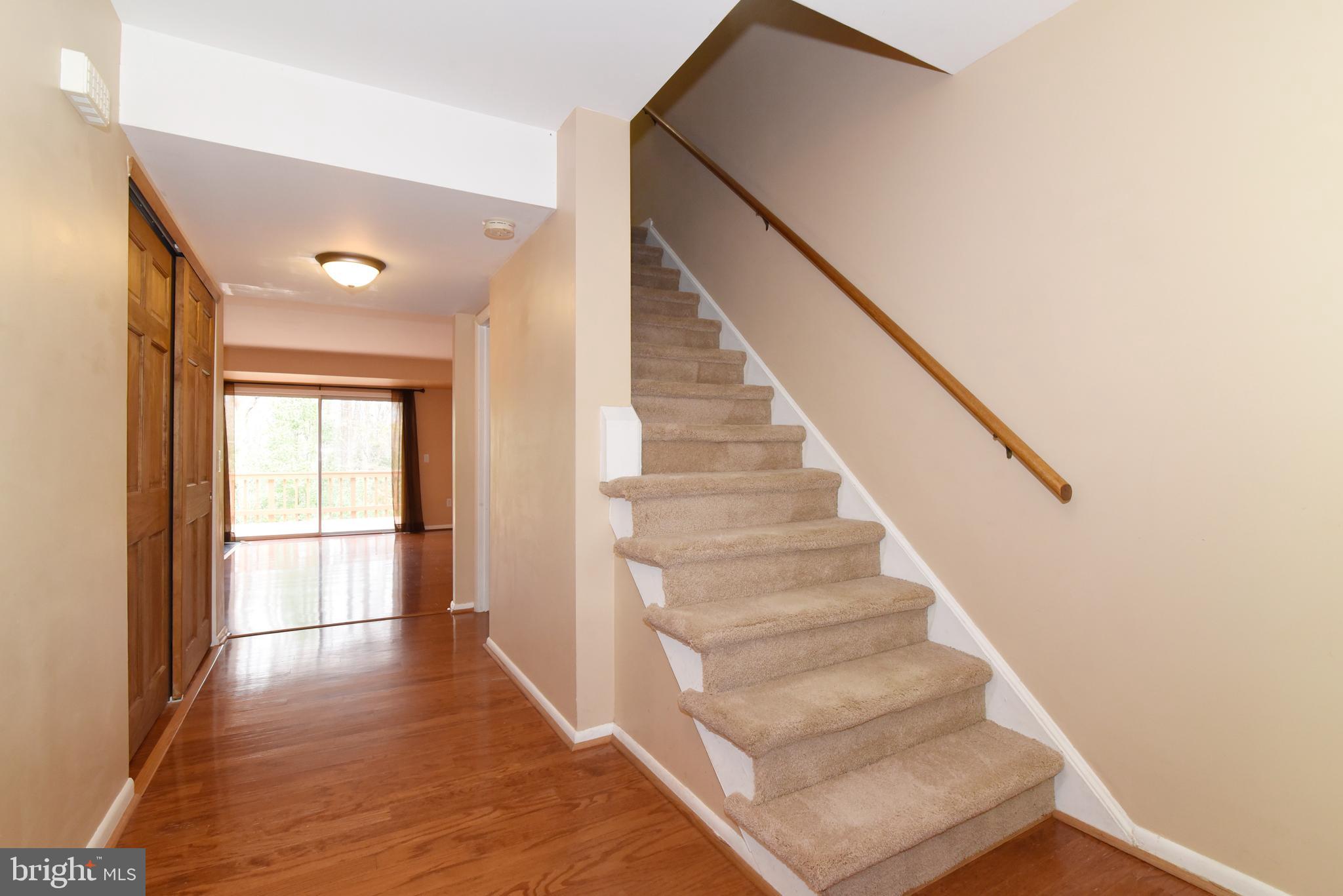 2334 Generation Drive Reston, VA 20191 - Photo 4 of 55 a view of staircase with white walls and windows
