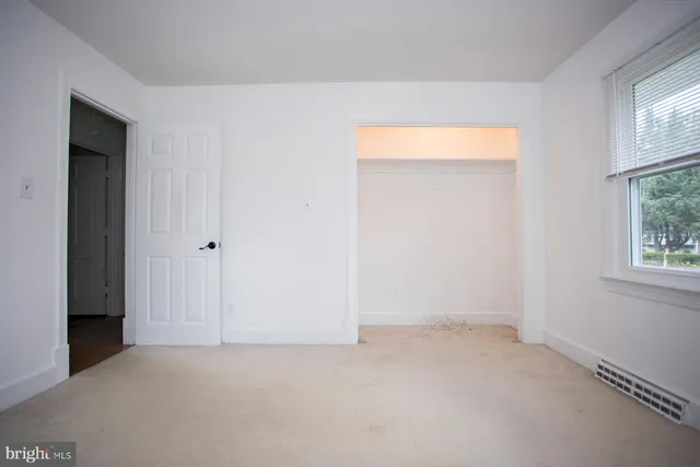 an empty room with a window