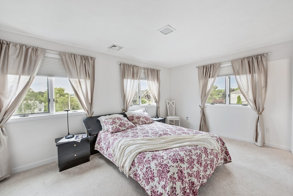 4 Yolande Road Marblehead, MA 01945 - Photo 22 of 30 a bedroom with a bed and a window