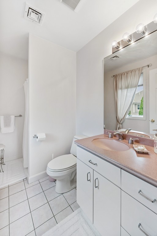 4 Yolande Road Marblehead, MA 01945 - Photo 23 of 30 a bathroom with a granite countertop sink mirror vanity and toilet