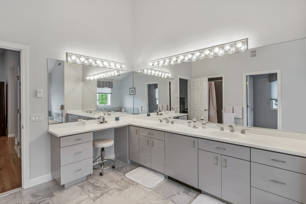 4 Yolande Road Marblehead, MA 01945 - Photo 26 of 30 a bathroom with a double vanity sink and mirror