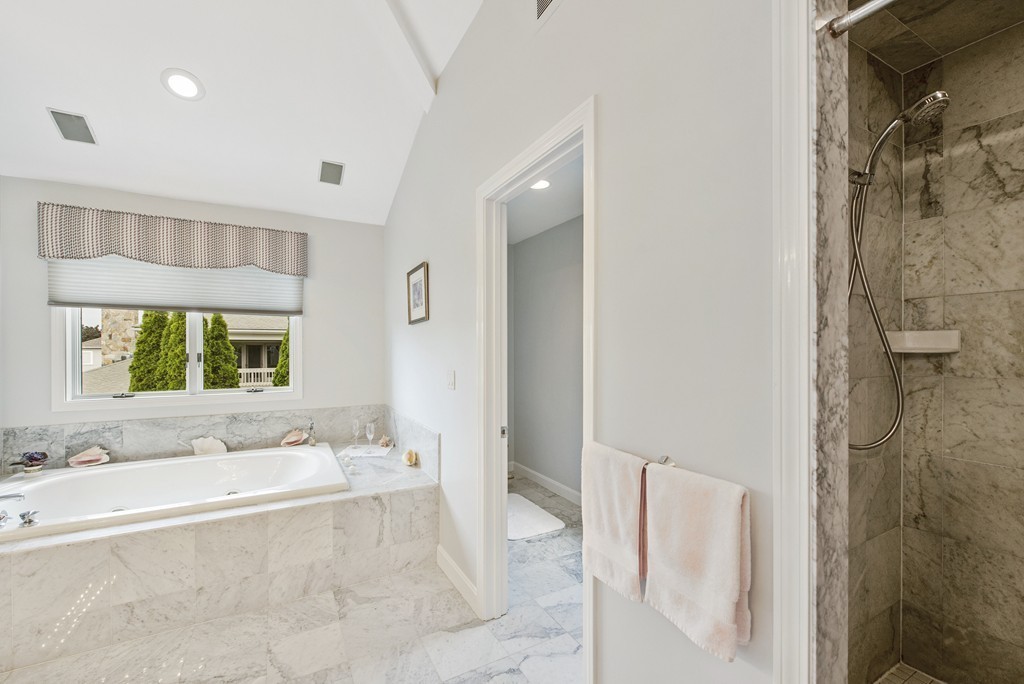 4 Yolande Road Marblehead, MA 01945 - Photo 27 of 30 a bathroom with a tub sink and mirror