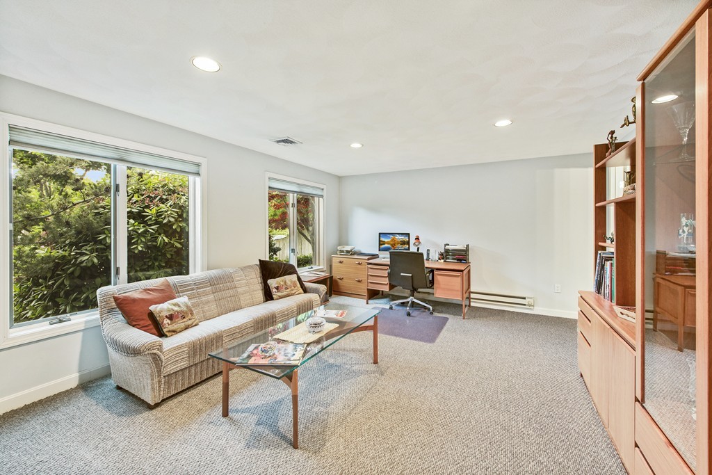 4 Yolande Road Marblehead, MA 01945 - Photo 28 of 30 a living room with furniture floor to ceiling window and a table