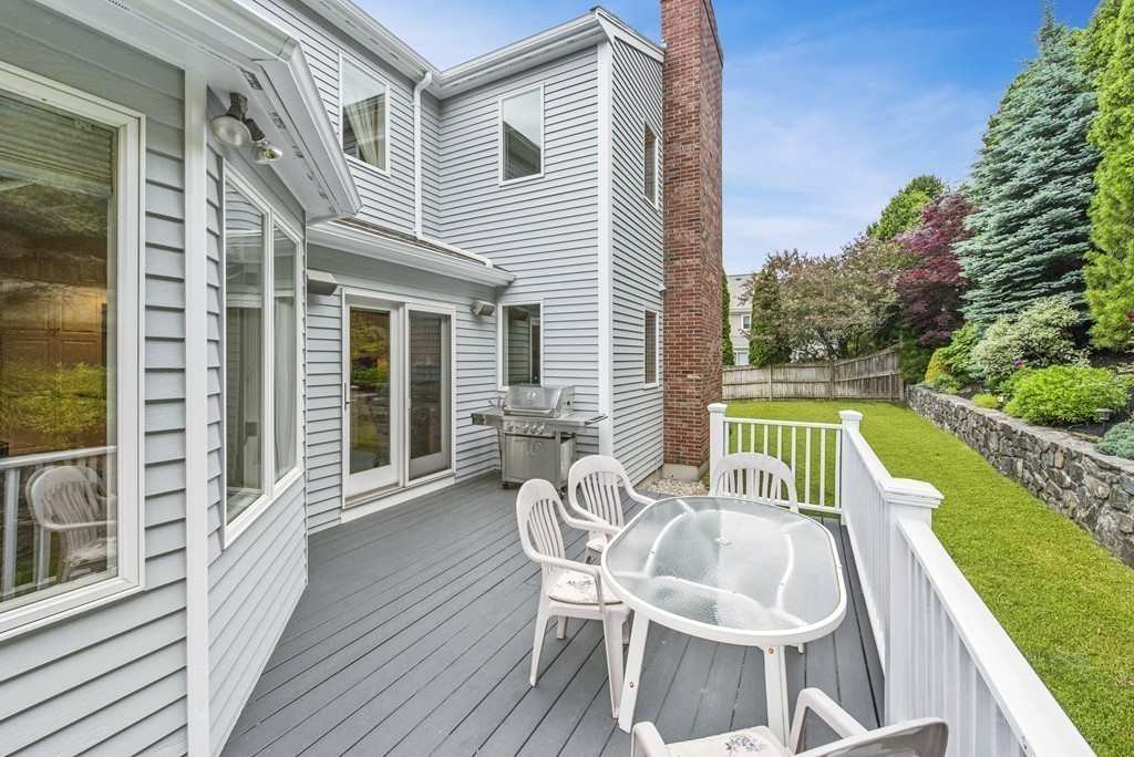 4 Yolande Road Marblehead, MA 01945 - Photo 9 of 30 a balcony with table and chairs