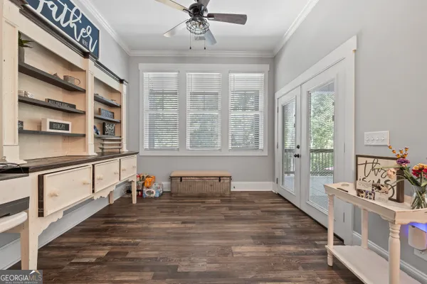 a kitchen with stainless steel appliances white cabinets and a sink