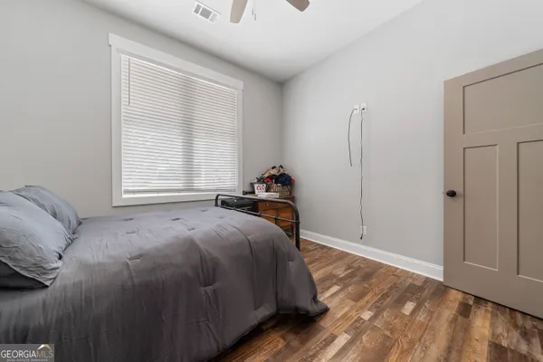 a bathroom with a sink double vanity and a mirror