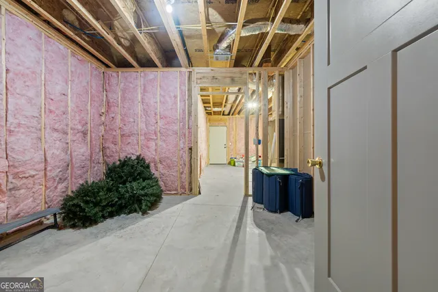 a bedroom with a bed and a ceiling fan