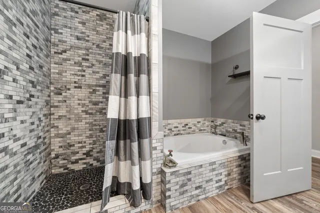 a view of a swimming pool with a patio