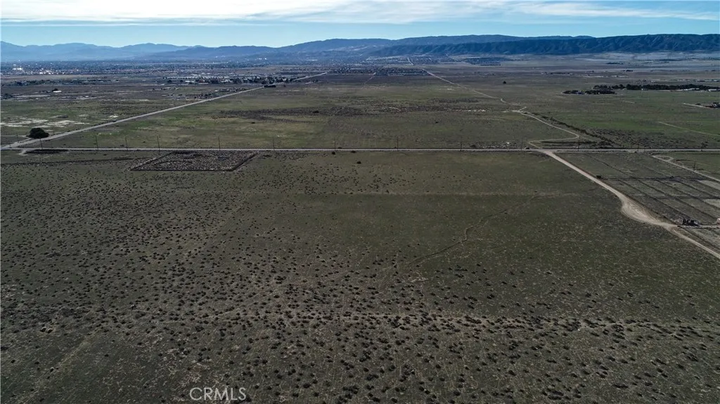 3 West H Lancaster, CA 93535 - Photo 3 of 8 a view of an outdoor space and a lake view