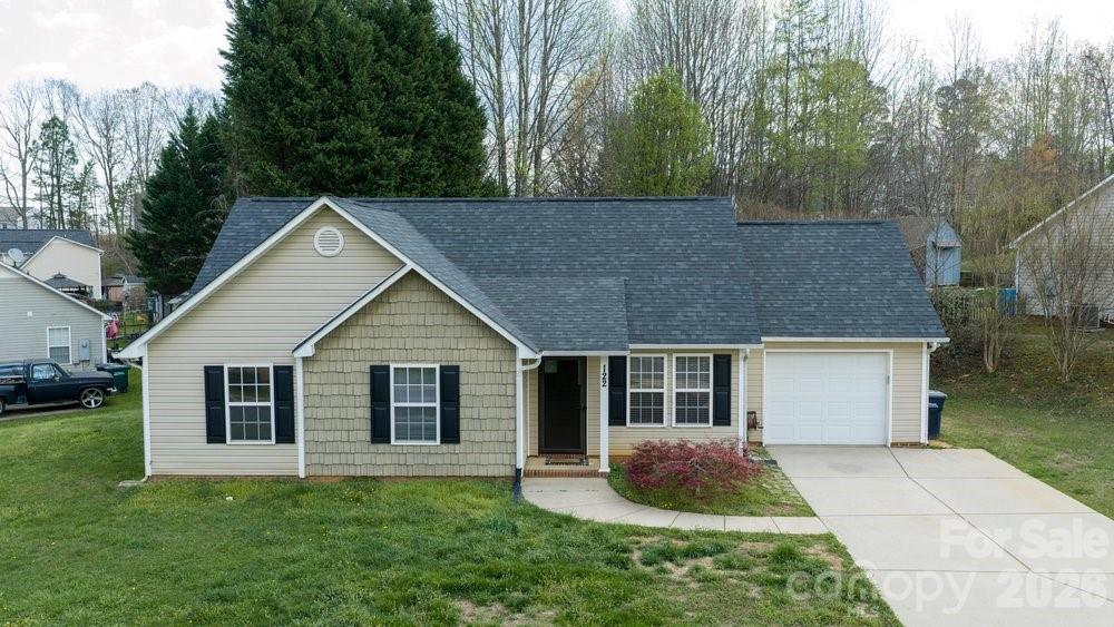 122 Addison Place Troutman, NC 28166 - Photo 1 of 40 front view of a house with a yard