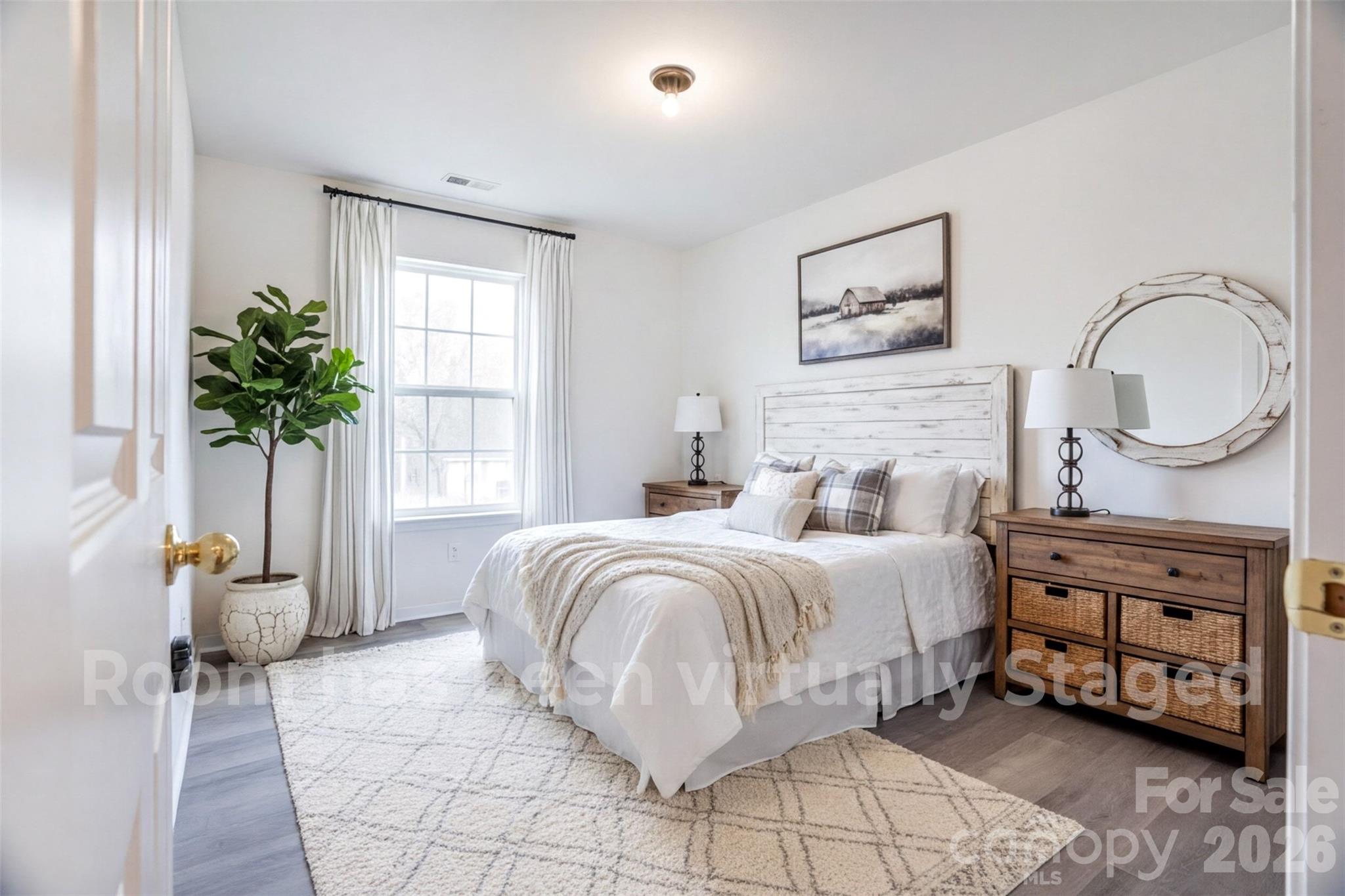 122 Addison Place Troutman, NC 28166 - Photo 22 of 40 a spacious bedroom with a bed and window