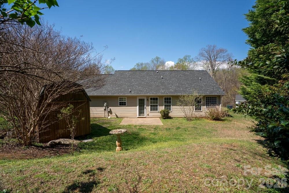 122 Addison Place Troutman, NC 28166 - Photo 29 of 40 a view of a house with a yard