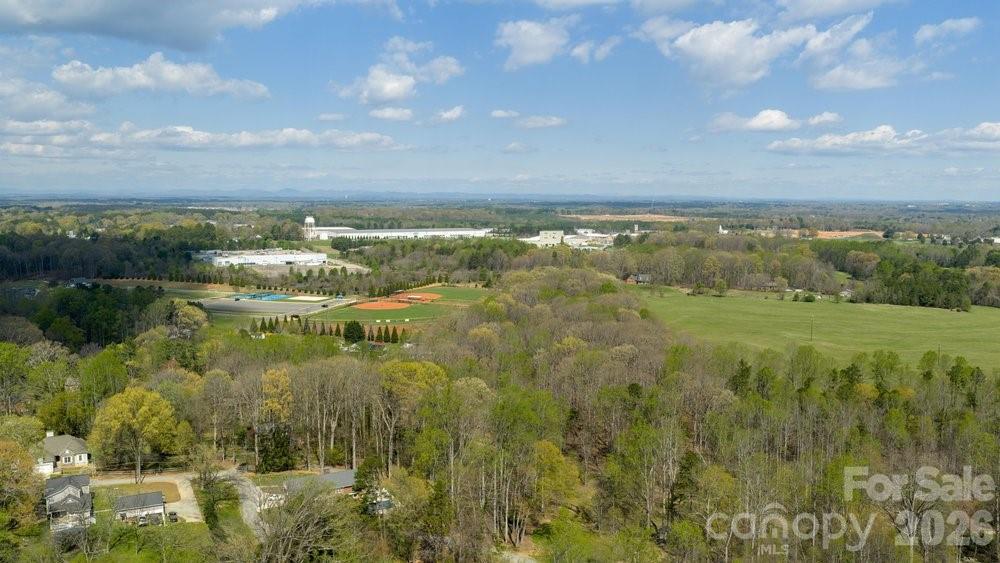 122 Addison Place Troutman, NC 28166 - Photo 32 of 40 a view of lake with city