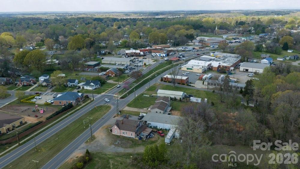 122 Addison Place Troutman, NC 28166 - Photo 34 of 40 an aerial view of residential houses with outdoor space