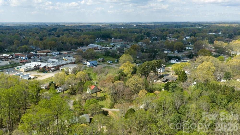 122 Addison Place Troutman, NC 28166 - Photo 38 of 40 a view of a lake with green field
