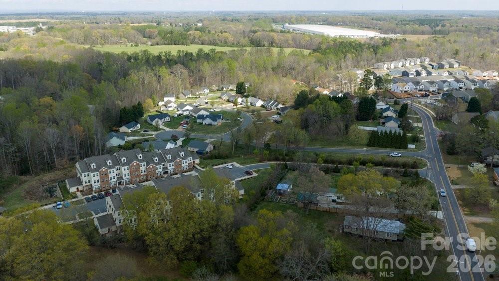 122 Addison Place Troutman, NC 28166 - Photo 39 of 40 a view of a lake with a mountain view
