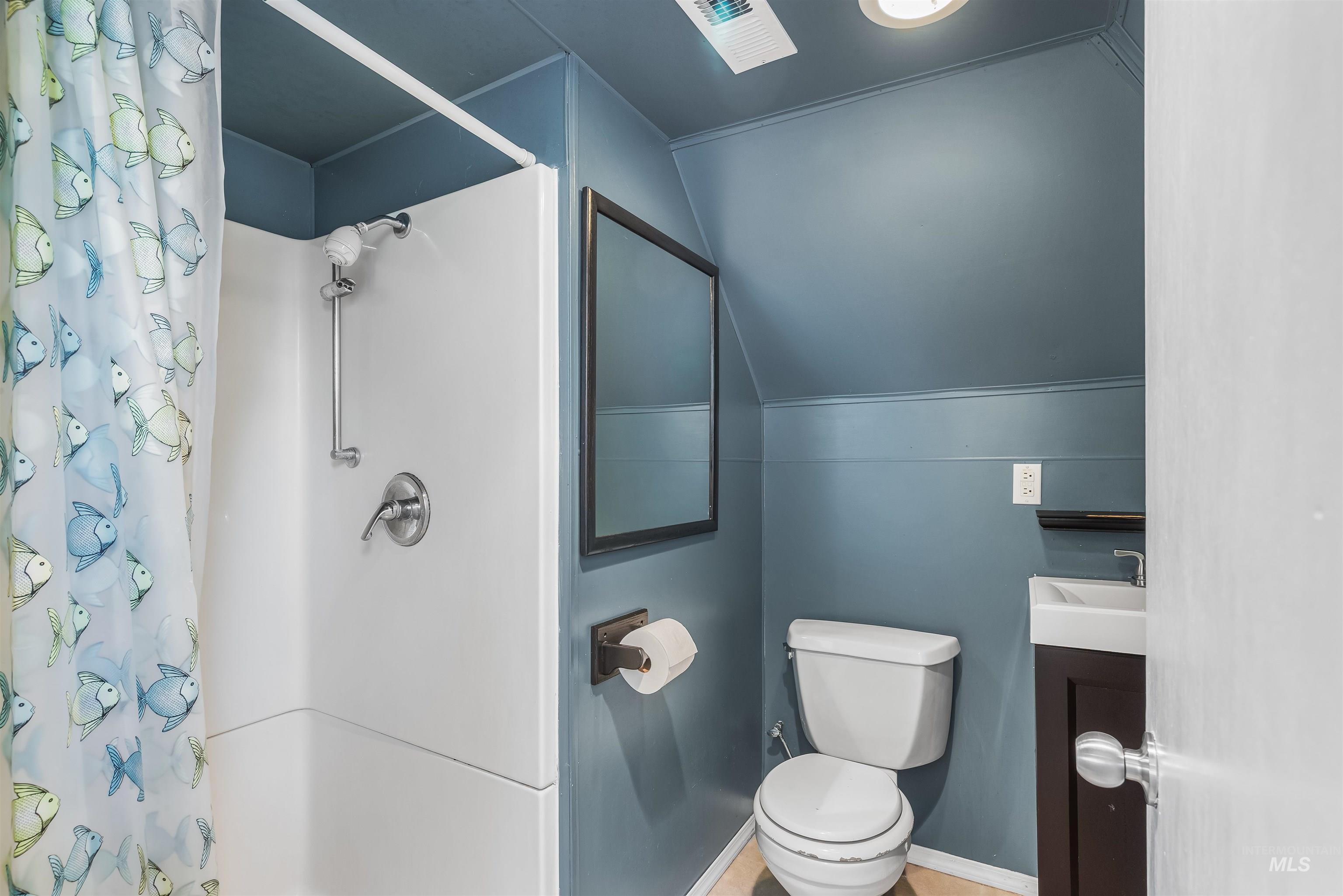 815 2nd Street Asotin, WA 99402 - Photo 23 of 50 Full bath featuring a shower with curtain and vanity