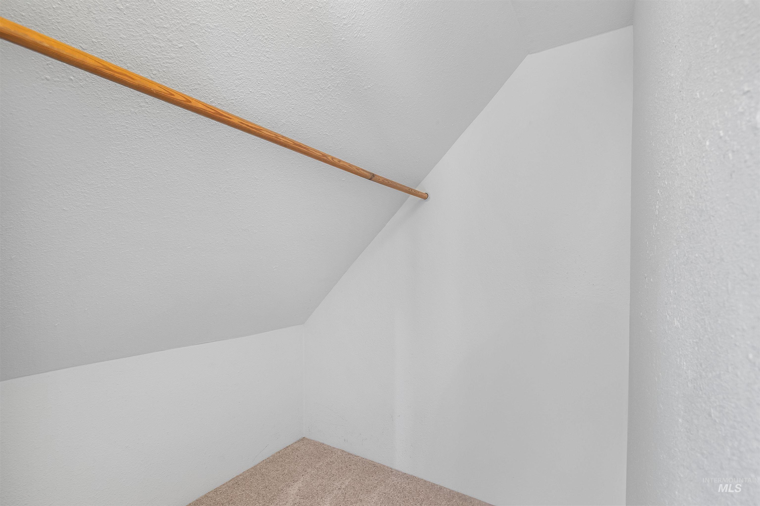 815 2nd Street Asotin, WA 99402 - Photo 26 of 50 Spacious closet with lofted ceiling and carpet flooring