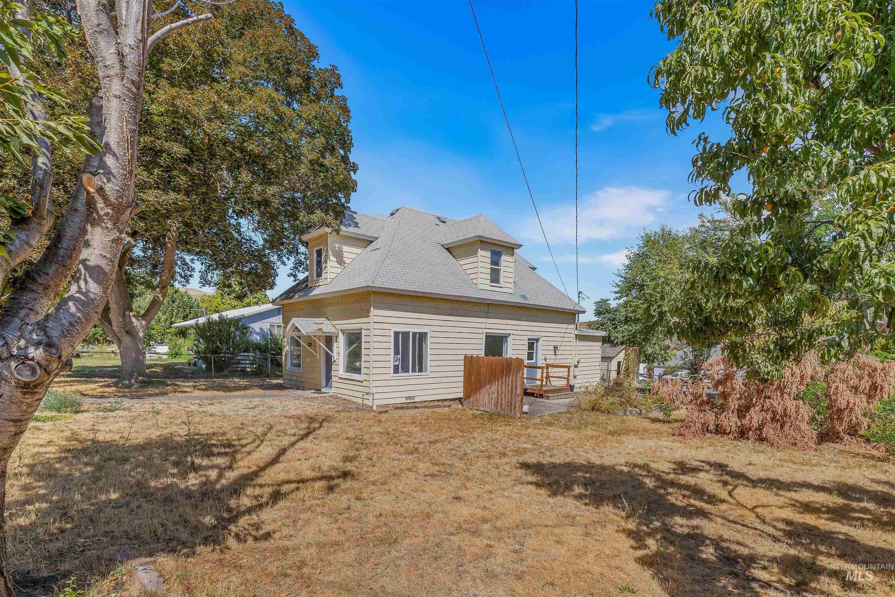 815 2nd Street Asotin, WA 99402 - Photo 43 of 50 Rear view of house featuring roof with shingles