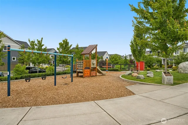 a view of swimming pool with a patio