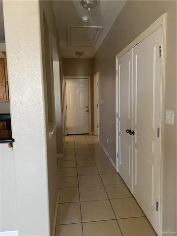 a view of closet area with empty racks