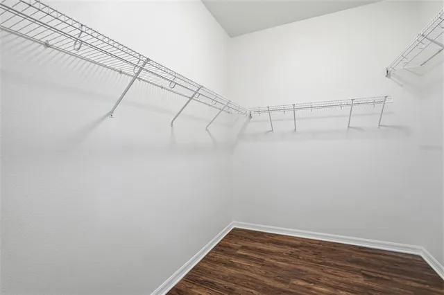 a view of a room with racks on the wall