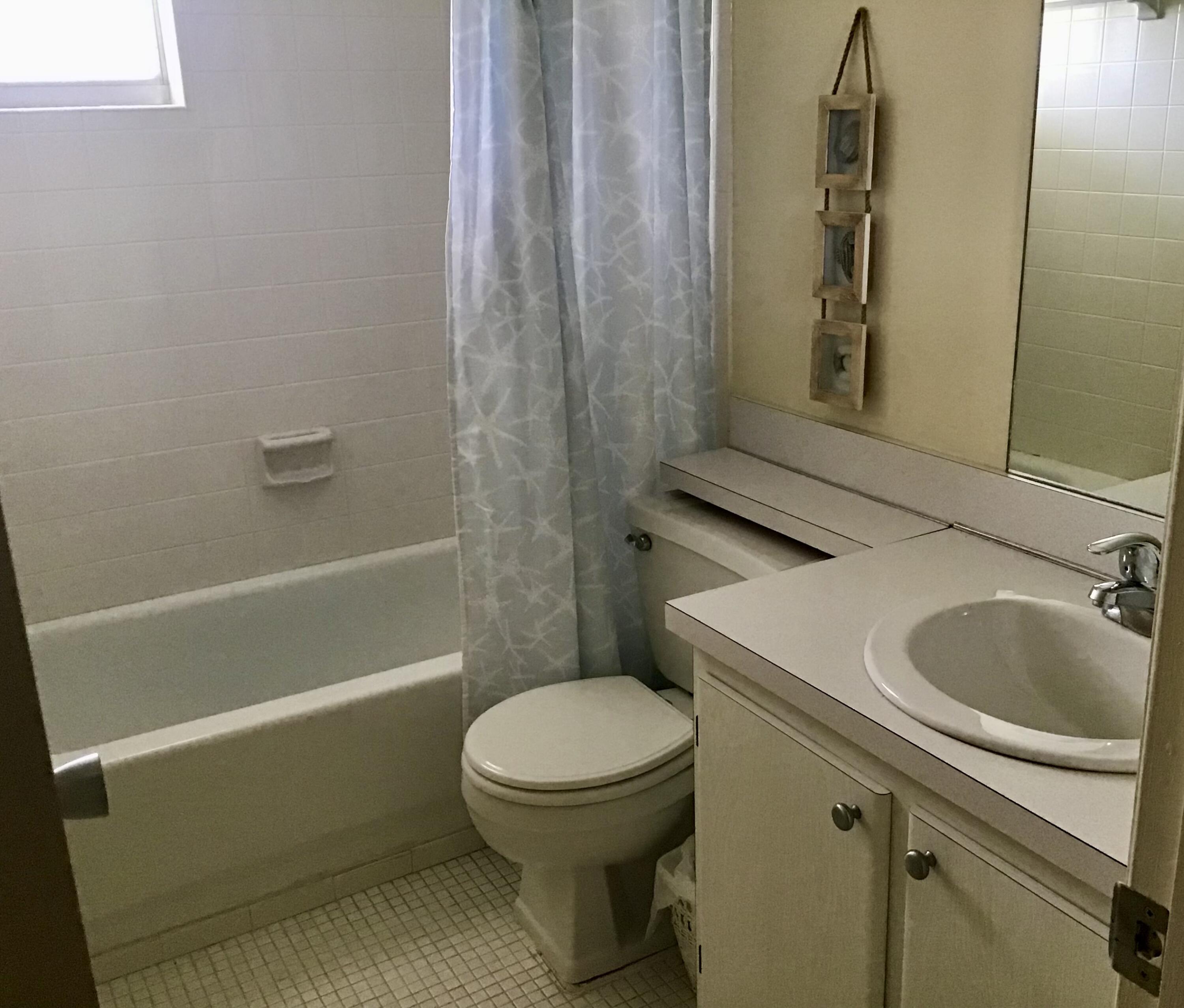 2222 Northeast 1st Way, Unit 204 Boynton Beach, FL 33435 - Photo 11 of 26 Guest Bathroom