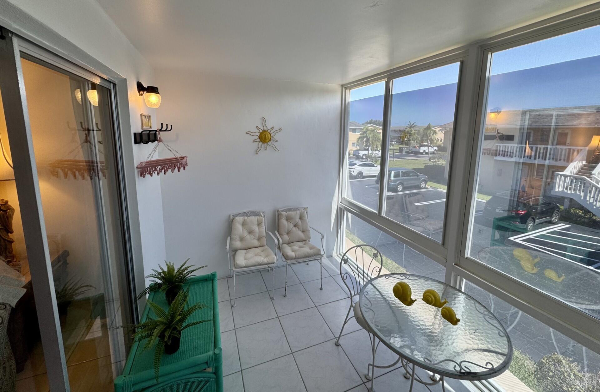 2222 Northeast 1st Way, Unit 204 Boynton Beach, FL 33435 - Photo 5 of 26 Enclosed Balcony