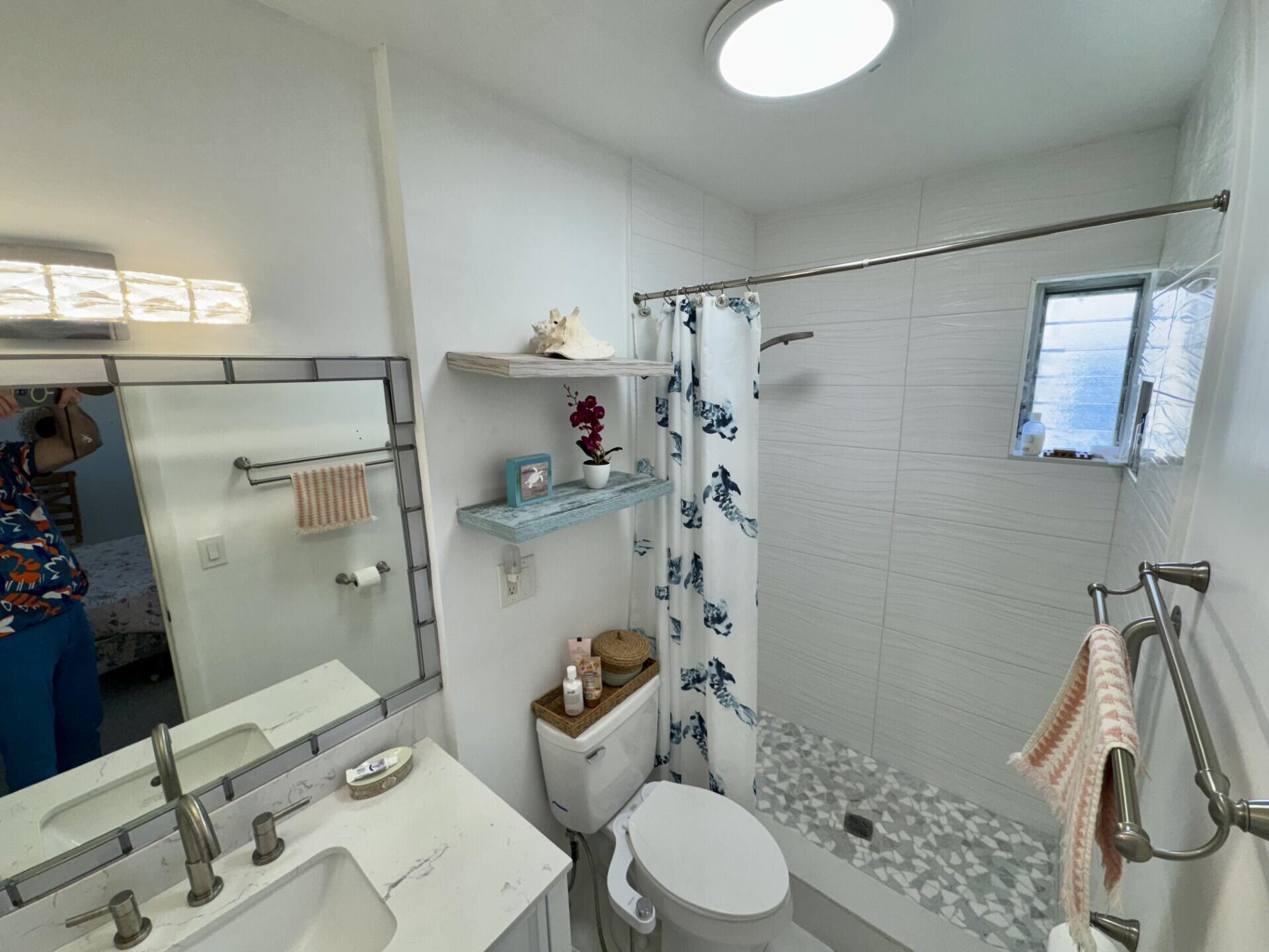 2222 Northeast 1st Way, Unit 204 Boynton Beach, FL 33435 - Photo 8 of 26 En-Suite Shower