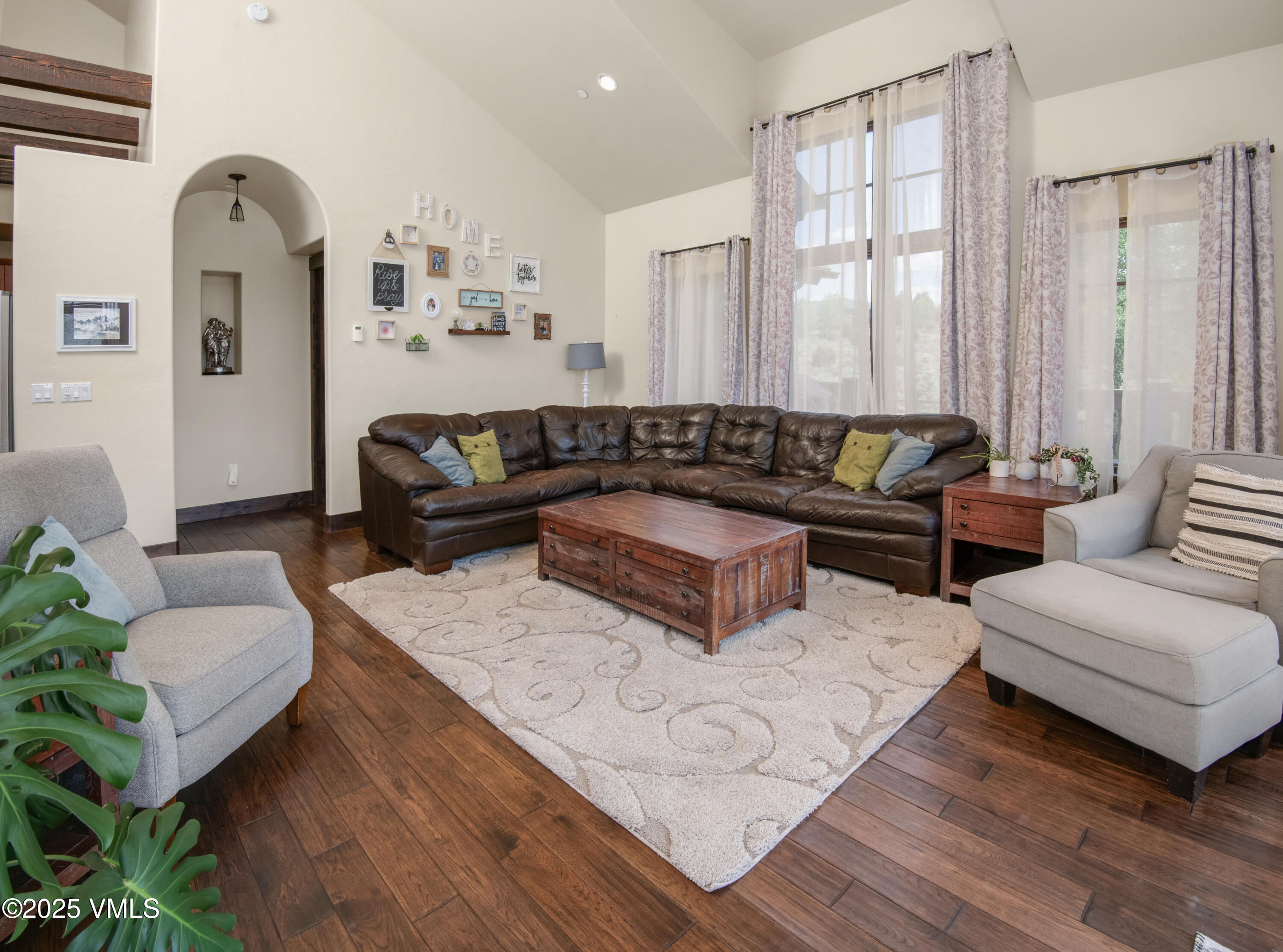 75 Aster Court Eagle, CO 81631 - Photo 16 of 68 a living room with furniture and a large window
