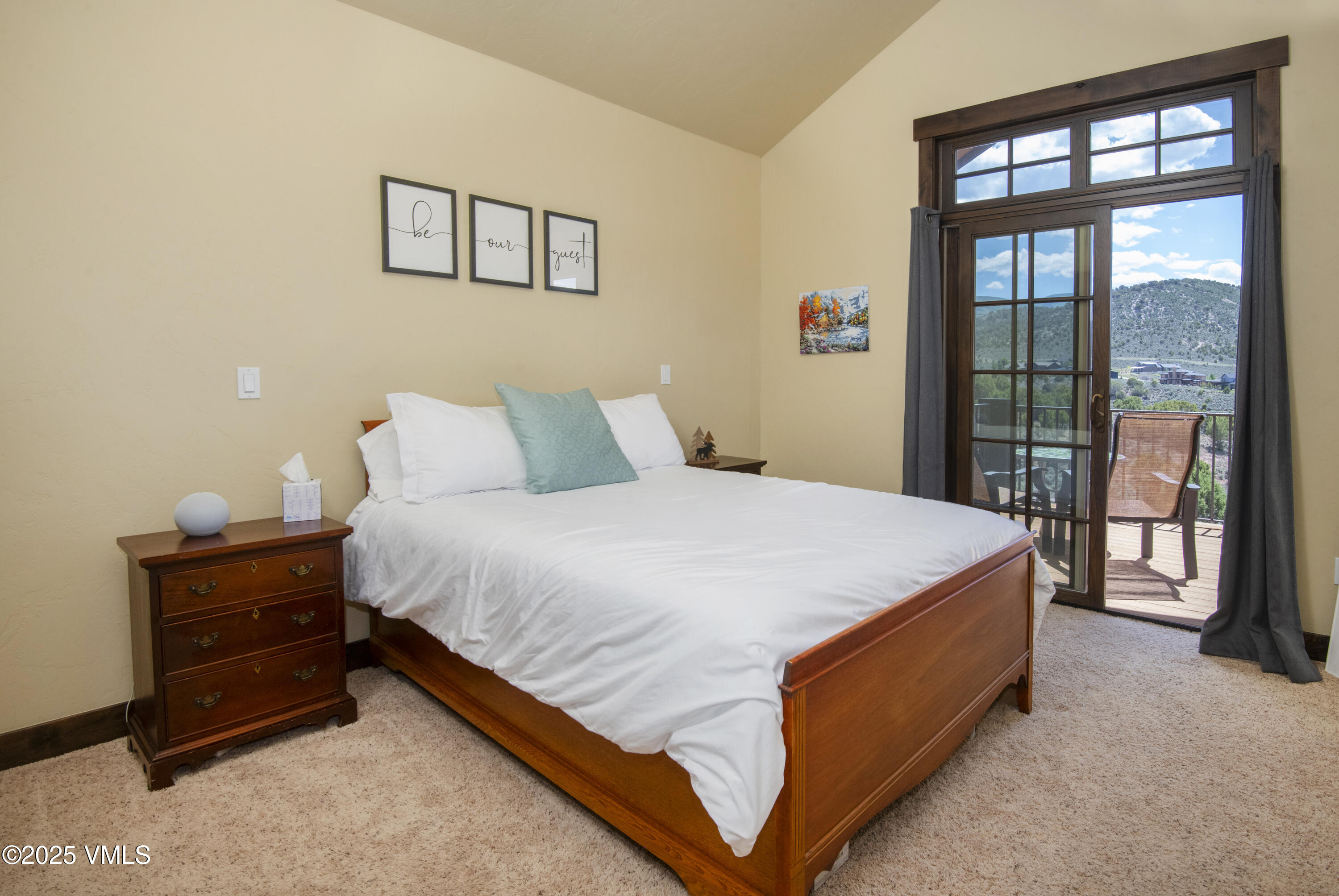 75 Aster Court Eagle, CO 81631 - Photo 27 of 68 a bed sitting in a bedroom next to a window