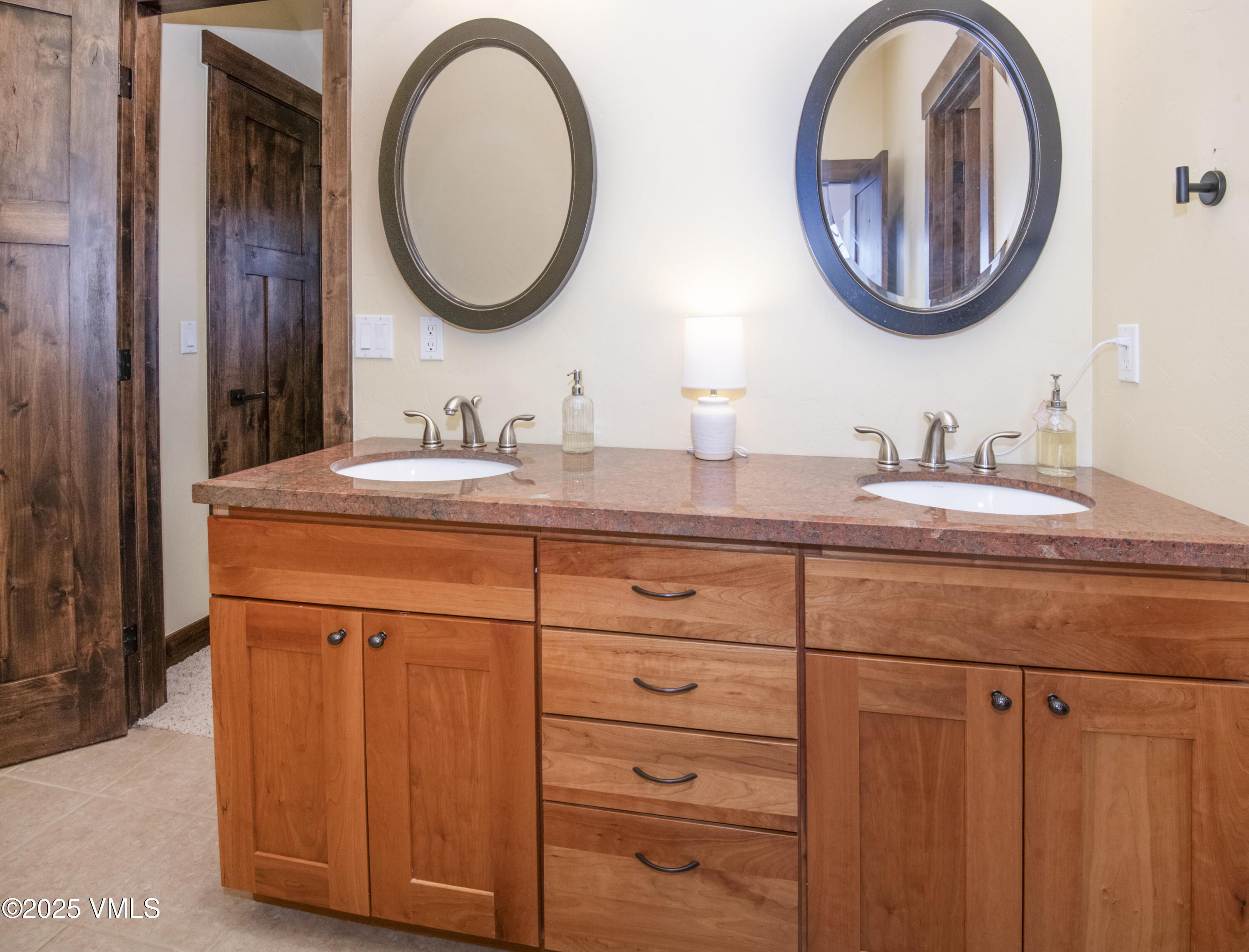 75 Aster Court Eagle, CO 81631 - Photo 32 of 68 a bathroom with a sink and a mirror