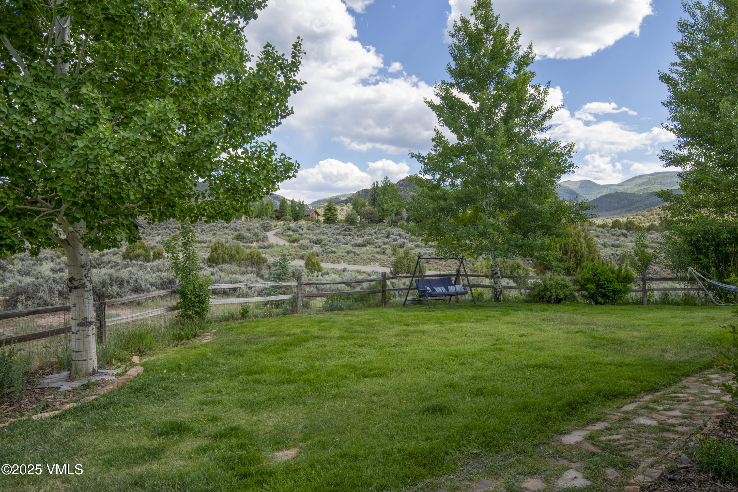 75 Aster Court Eagle, CO 81631 - Photo 56 of 68 a view of a house with a yard