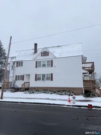a front view of a building with street
