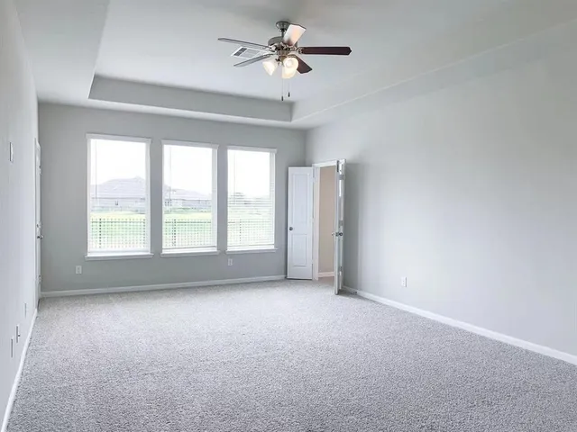 a view of a room that has a window in it