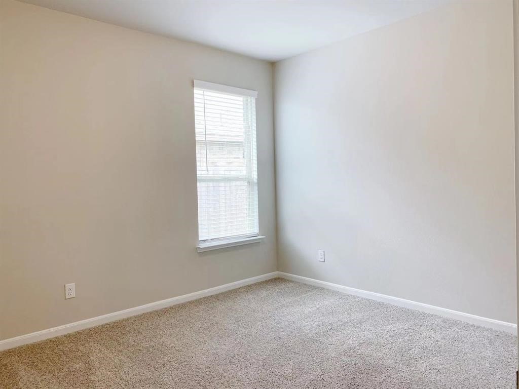 29026 Endeavor River Road Katy, TX 77494 - Photo 17 of 27 an empty room with a window