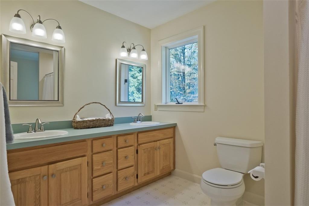 61 Kelsey Ridge Road Freeport, ME 04032 - Photo 24 of 35 The master bath has a double vanity,...