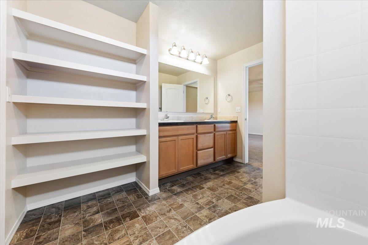 1555 Condor Drive Middleton, ID 83644 - Photo 28 of 50 Built-in shelving unit with five tiers