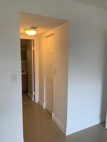 a view of a room with an empty space