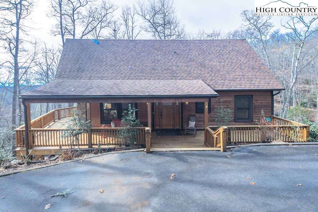 272 Locust Road Newland, NC 28657 - Photo 3 of 46 a view of house with outdoor space and sitting area