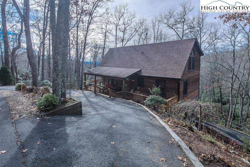 272 Locust Road Newland, NC 28657 - Photo 46 of 46 a view of a house with a yard and tree s