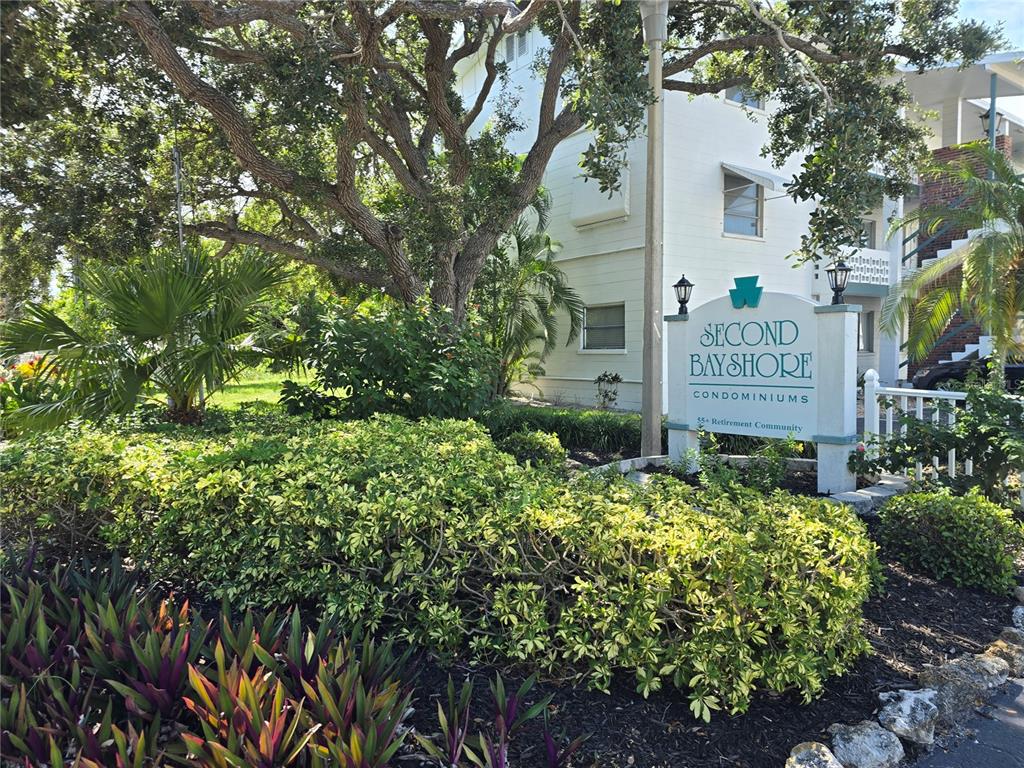 5850 Welcome Road, Unit J6 Bradenton, FL 34207 - Photo 1 of 30 a sign on the side of a road