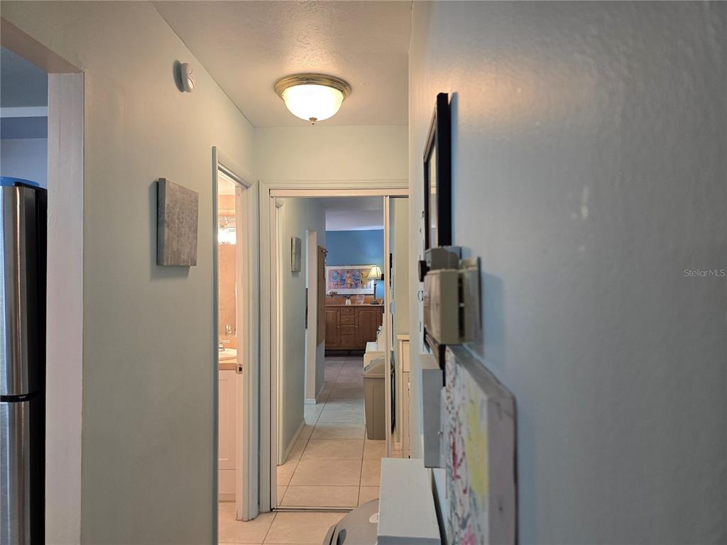 5850 Welcome Road, Unit J6 Bradenton, FL 34207 - Photo 12 of 30 a view of a hallway and a livingroom with a furniture