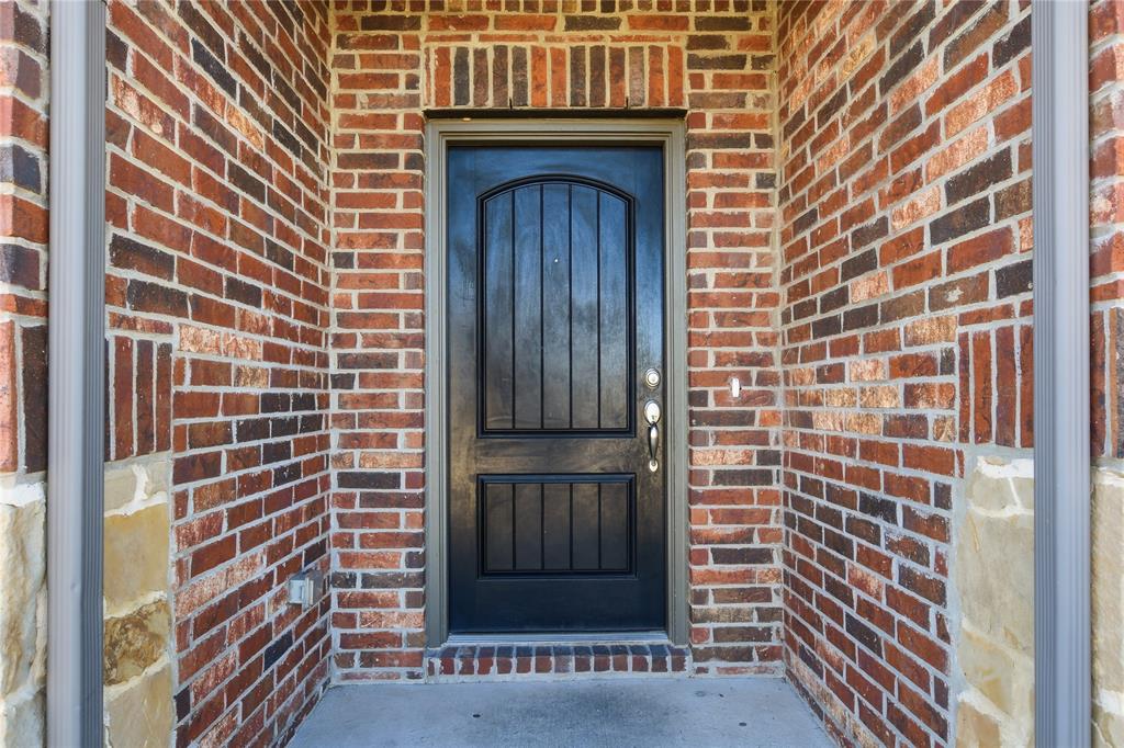339 Blanco Drive Forney, TX 75126 - Photo 3 of 24 Entrance to property with brick siding