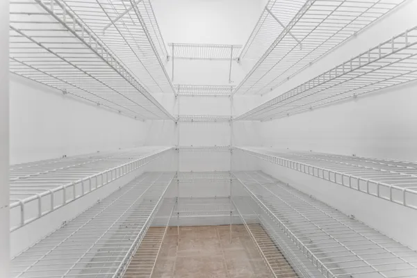 a view of an empty walk in closet