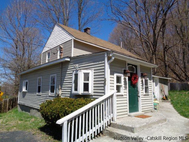 65 Pancake Hollow Road Highland, NY 12528 - Photo 1 of 19 a front view of house with deck and garden