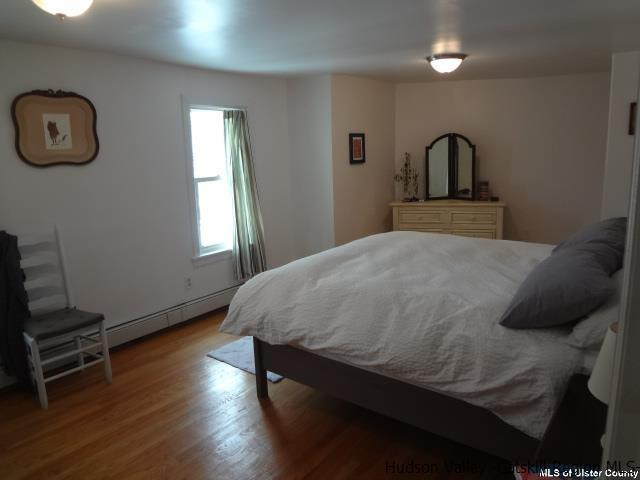 65 Pancake Hollow Road Highland, NY 12528 - Photo 12 of 19 a bedroom with a bed and a window