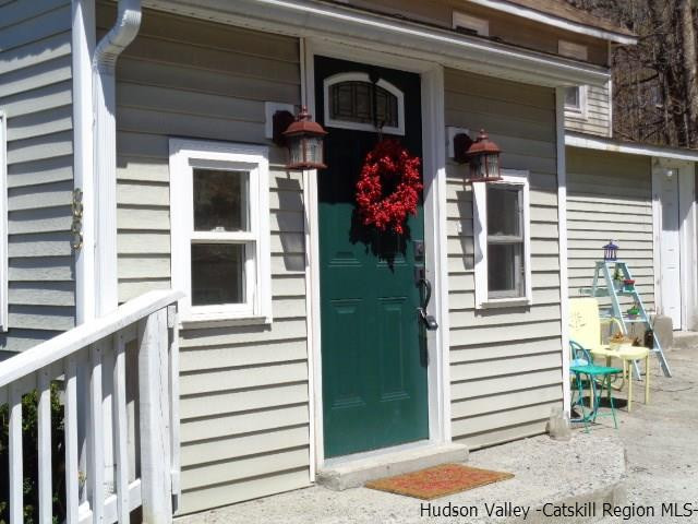 65 Pancake Hollow Road Highland, NY 12528 - Photo 18 of 19 a front view of a house with a white fence