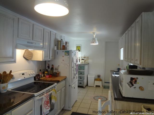 65 Pancake Hollow Road Highland, NY 12528 - Photo 2 of 19 a kitchen with a sink and cabinets