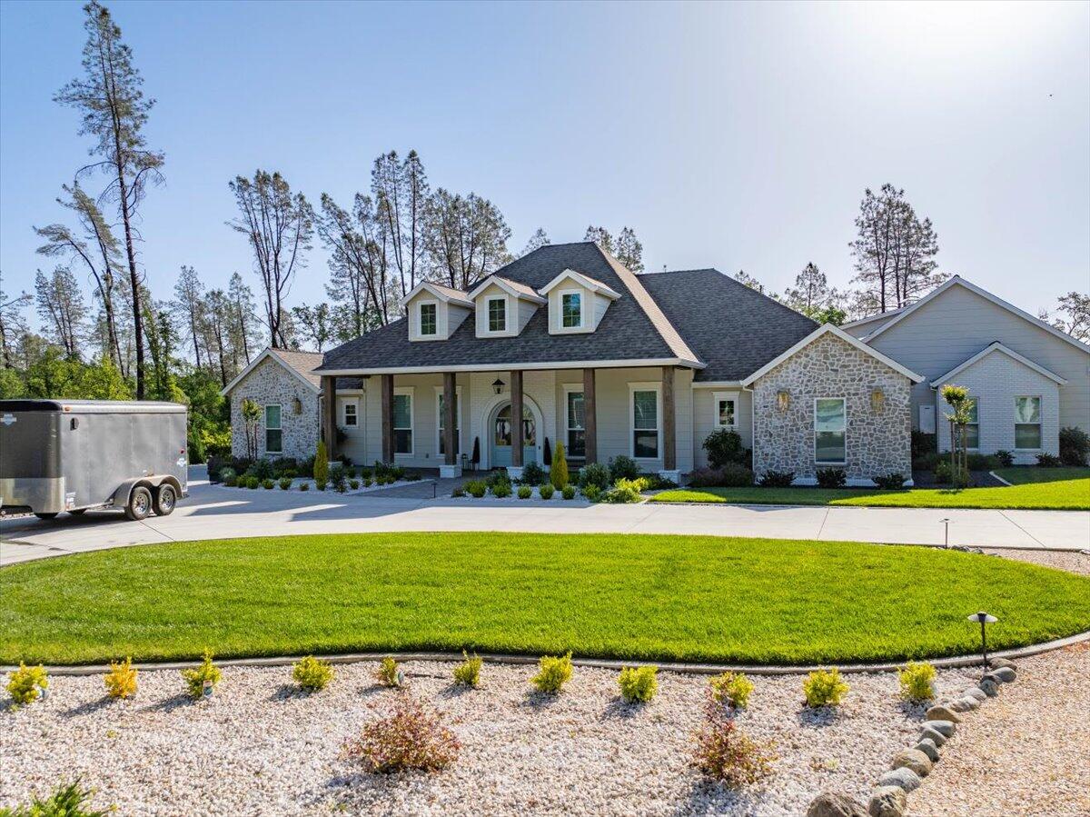 3 Silver King Road Redding, CA 96001 - Photo 10 of 13 a front view of house with yard and outdoor seating